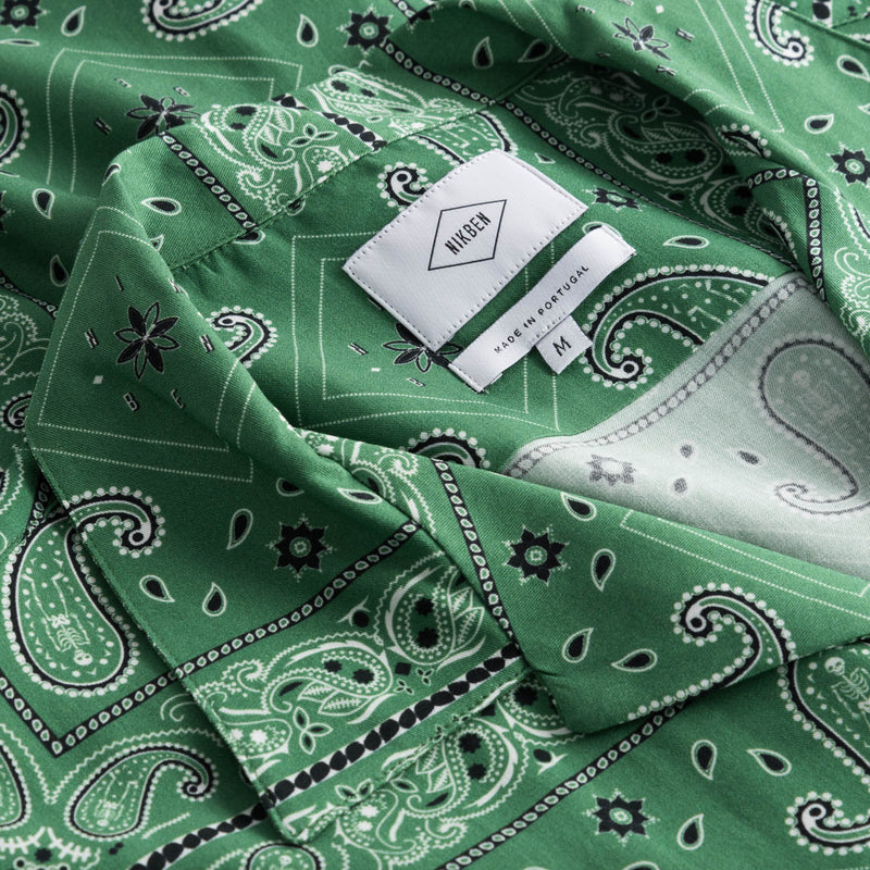 Collar and lable on green vacation shirt