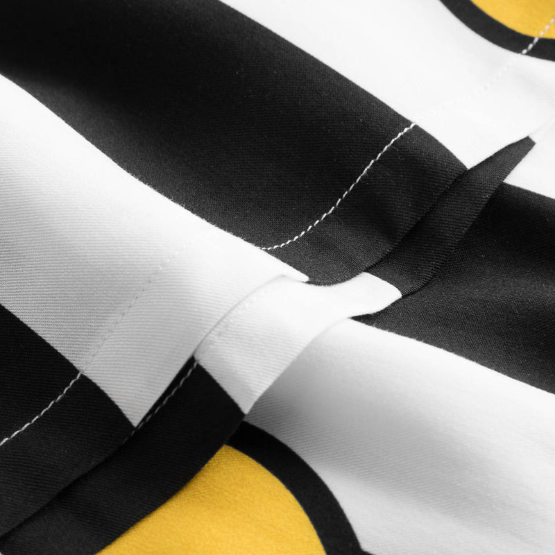 Close up of black-white vacation shirt with lemons