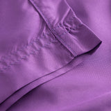 Close up of purple swim trunks