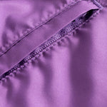 Back zip pocket on purple swim trunks