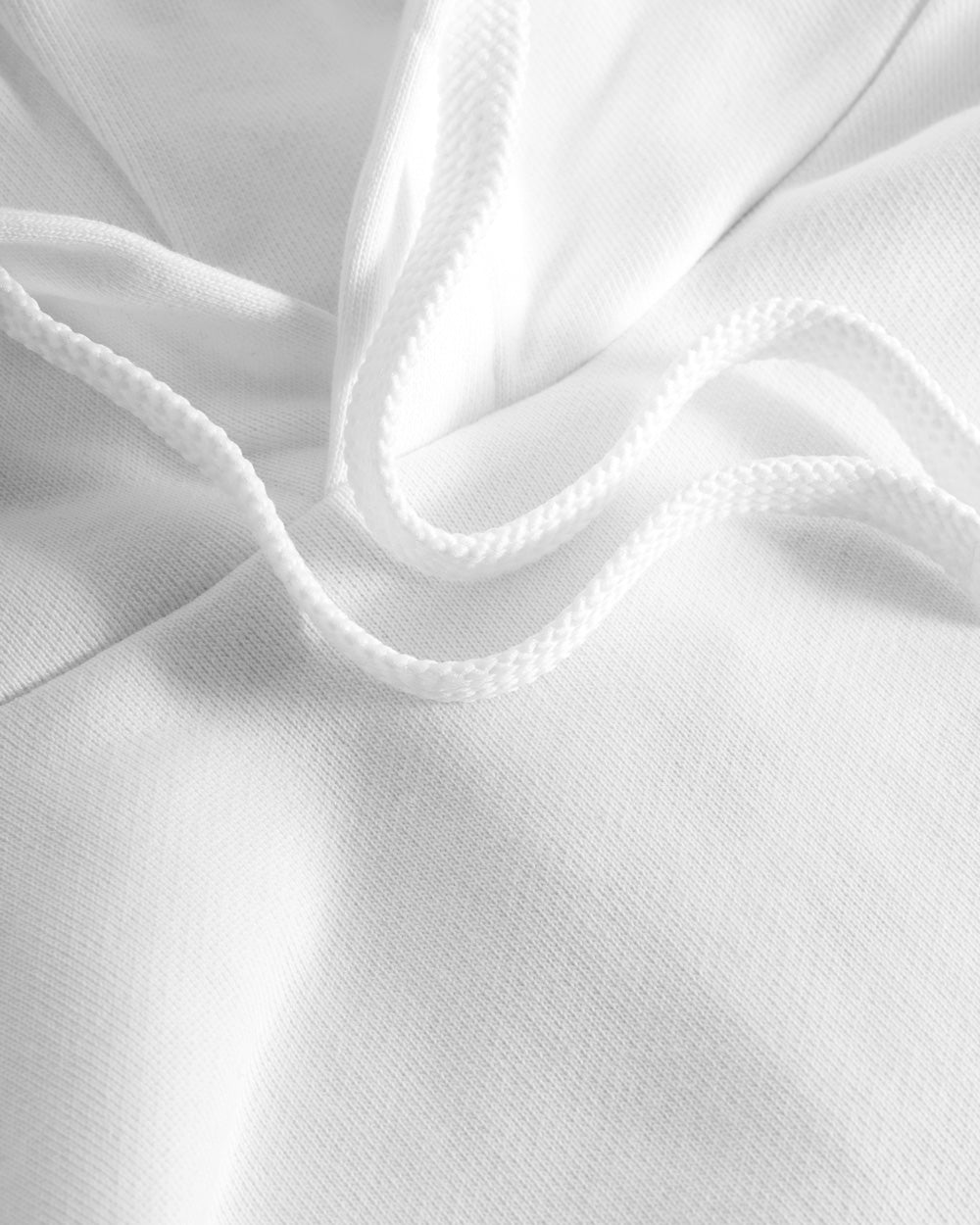 White drawstrings on white hoodie