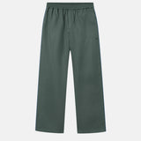 Green vacation pants with two front pockets and an elastic drawstring.