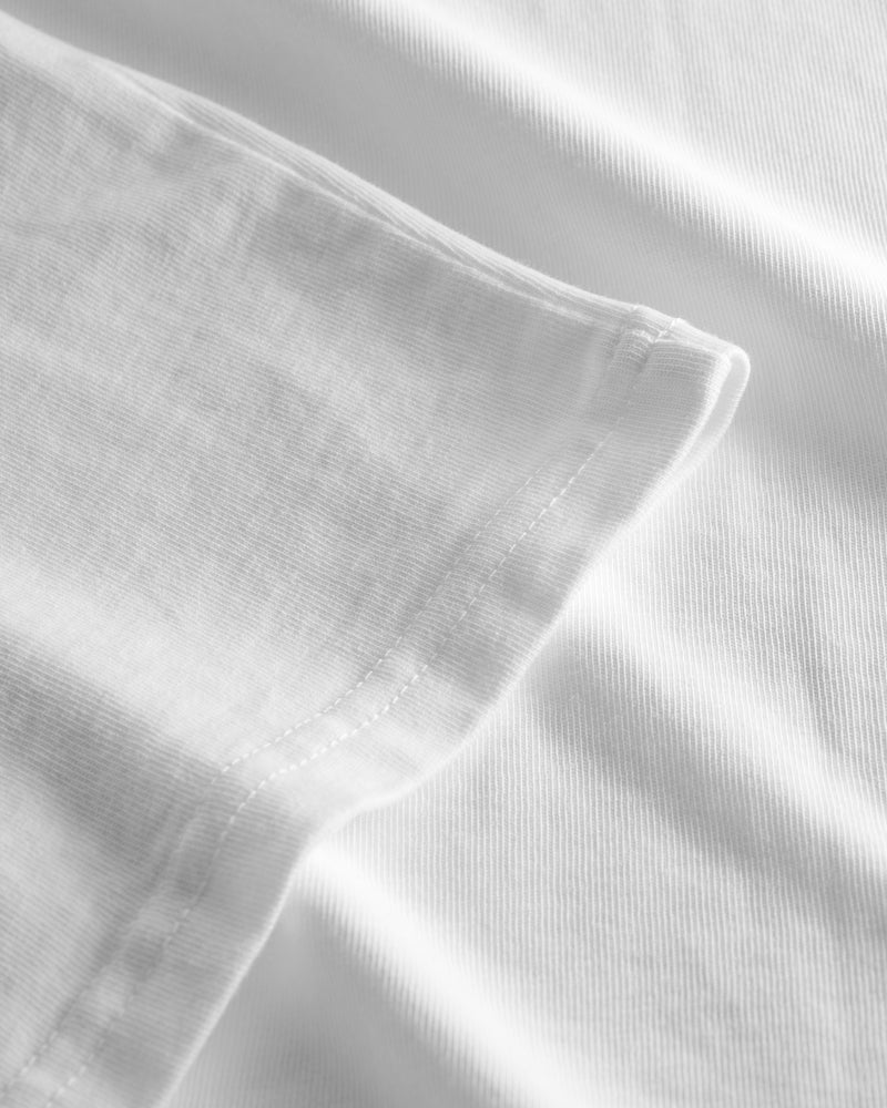 Sleeve on white t-shirt