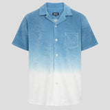 White and sky blue short sleeve shirt with white button closure and one chest pocket