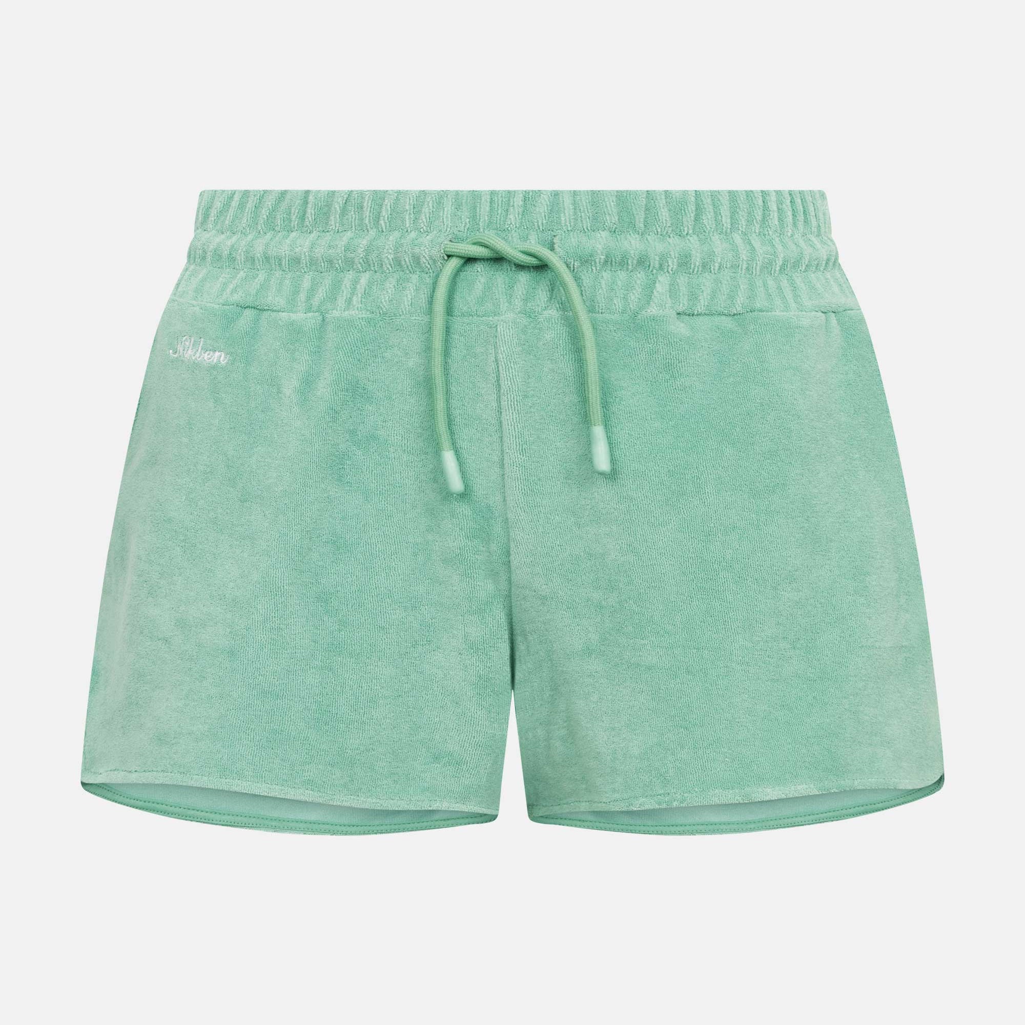 Grey-green low cut shorts in terry toweling fabric with drawstring and two side pockets.