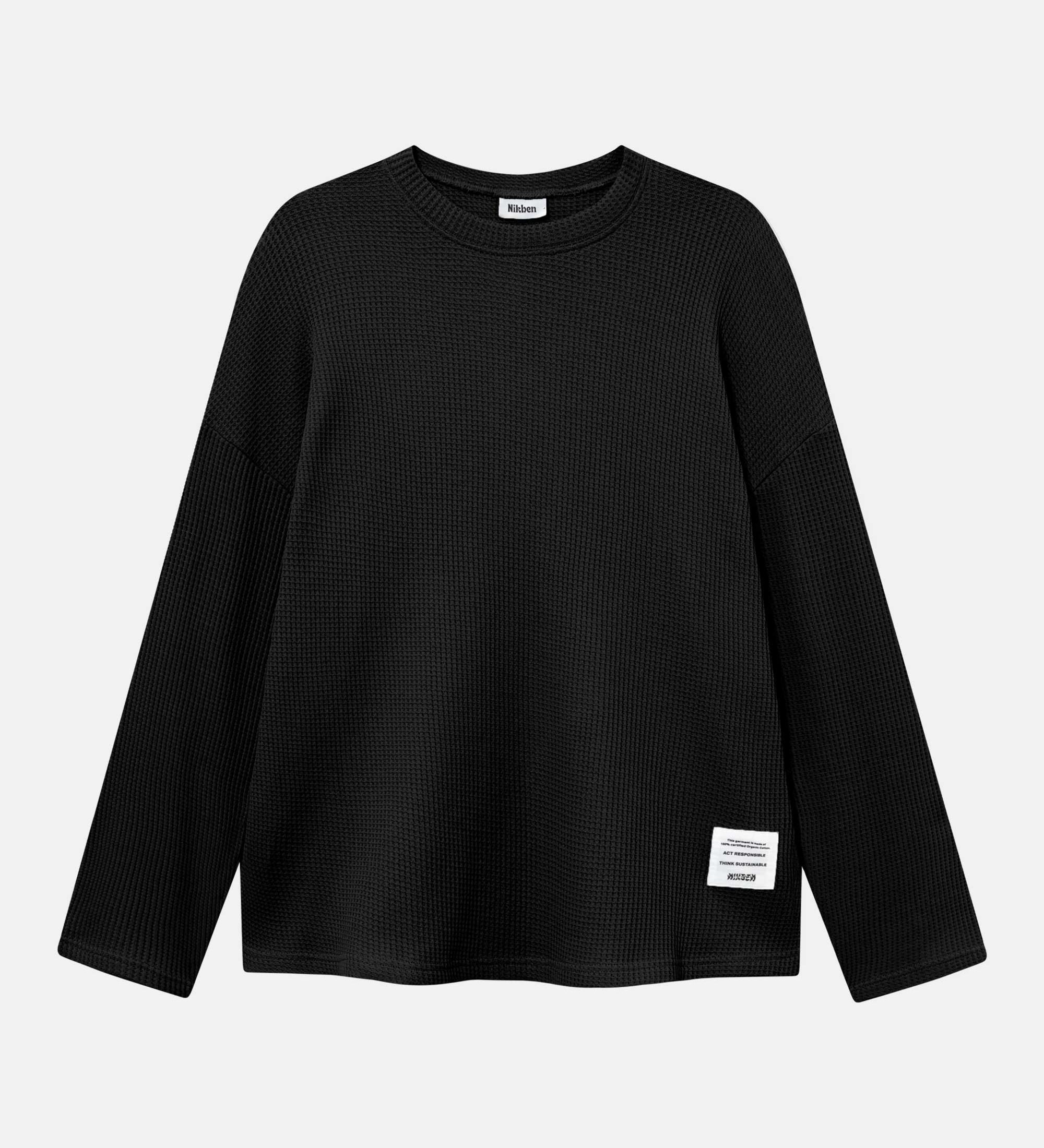 Black waffle-patterned sweatshirt with a stitched-on material label.