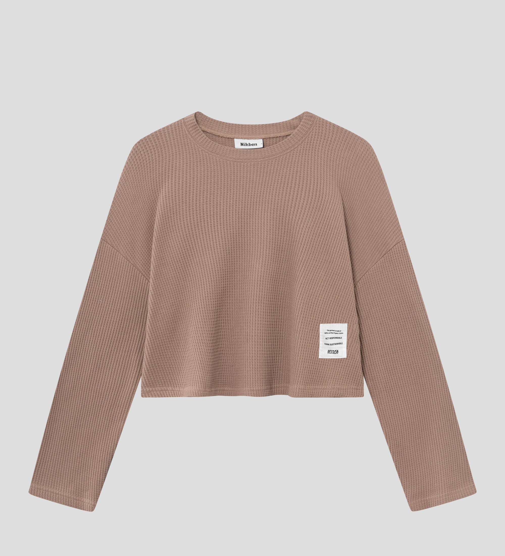 Brown waffle-patterned cropped sweatshirt with a stitched-on material label.