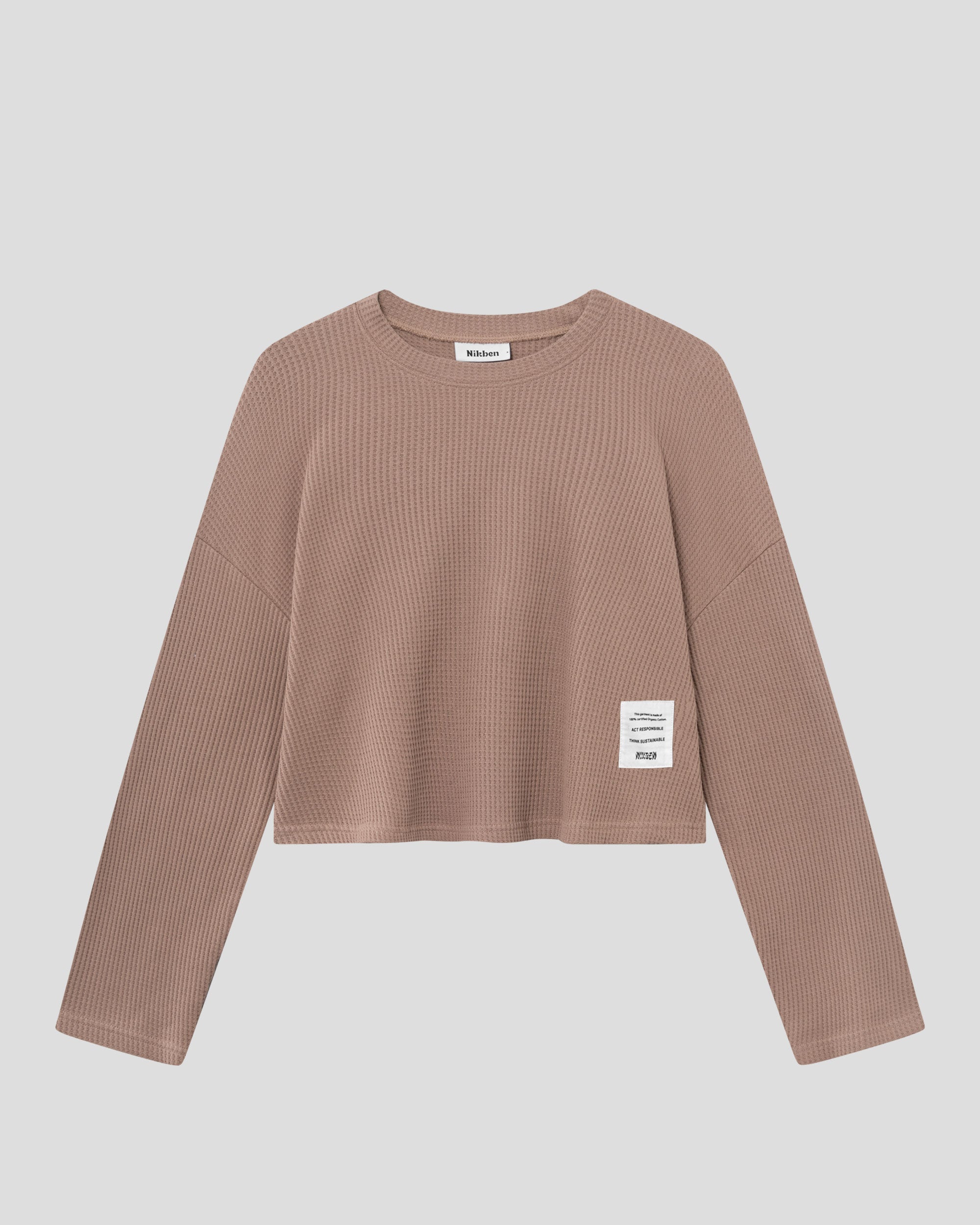 Brown waffle-patterned cropped sweatshirt with a stitched-on material label.