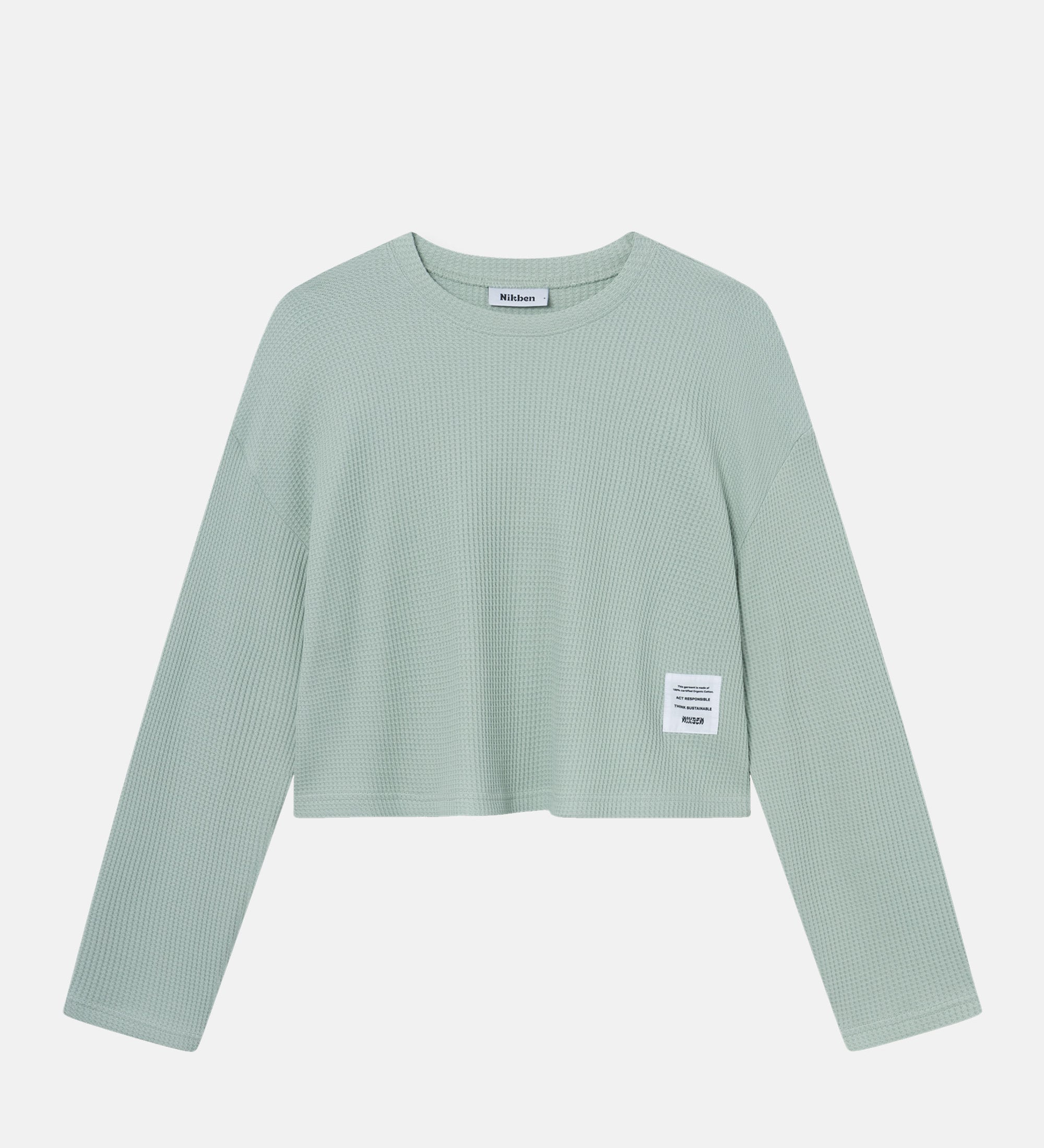 Mint green waffle-patterned cropped sweatshirt with a stitched-on material label.