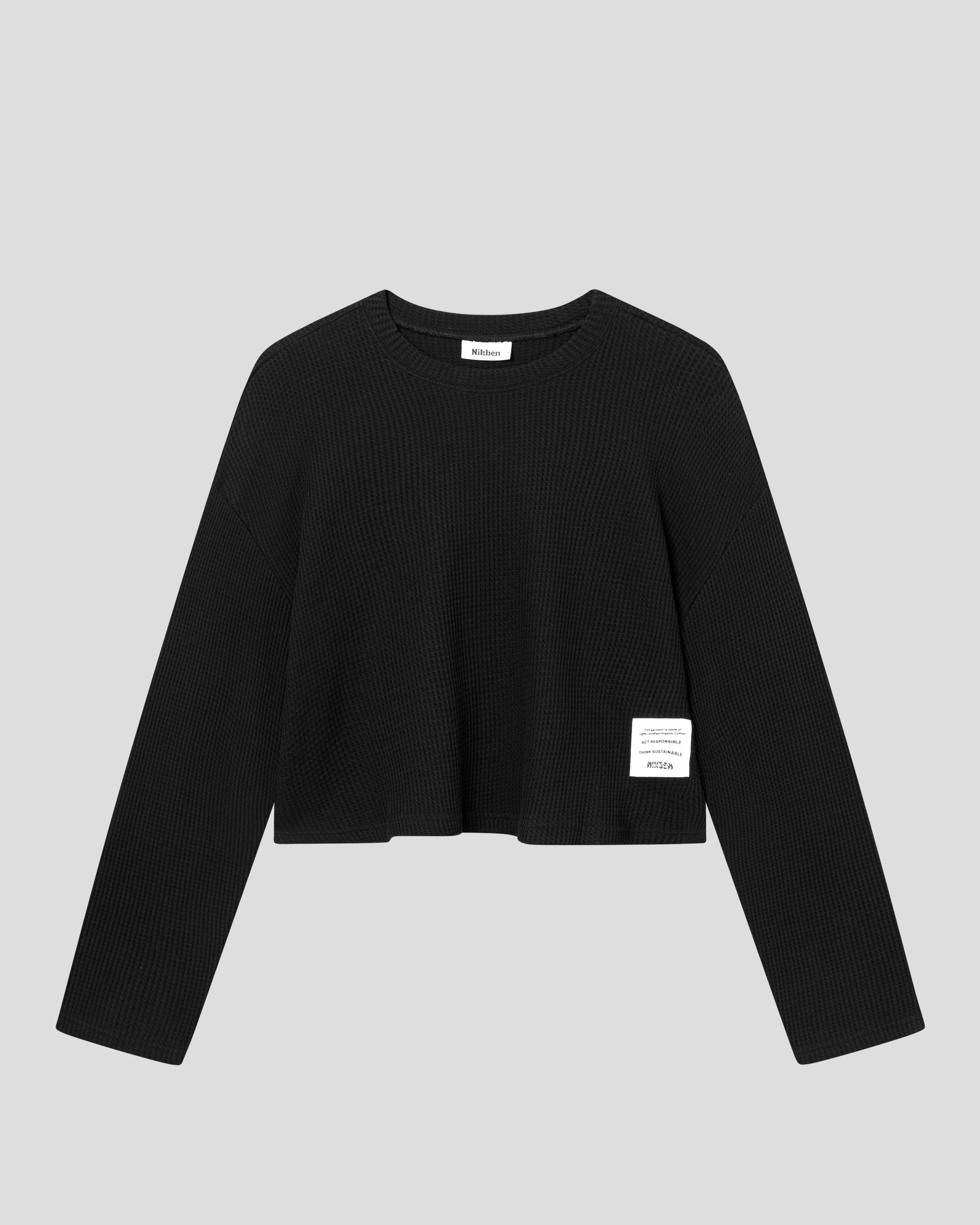 Black waffle-patterned cropped sweatshirt with a stitched-on material label.