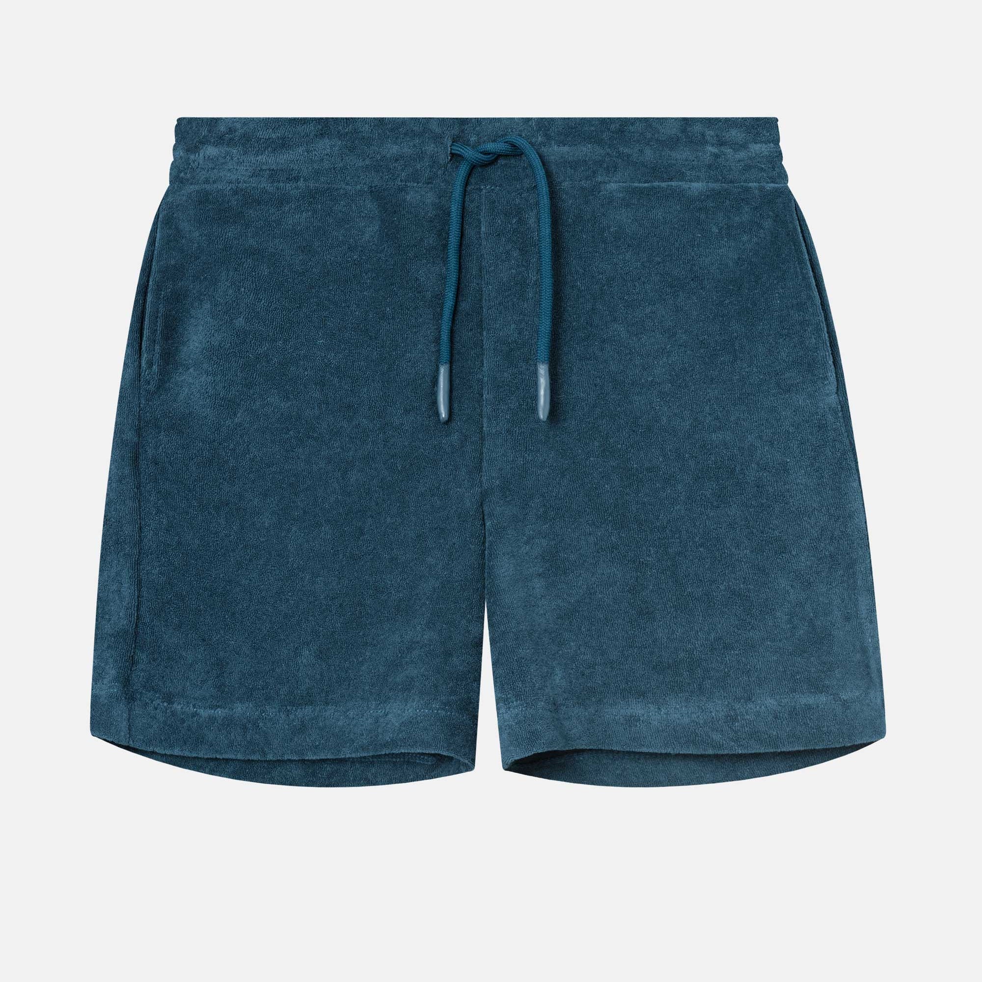 Dark blue mid length shorts in terry toweling fabric with drawdtring and two side pockets.