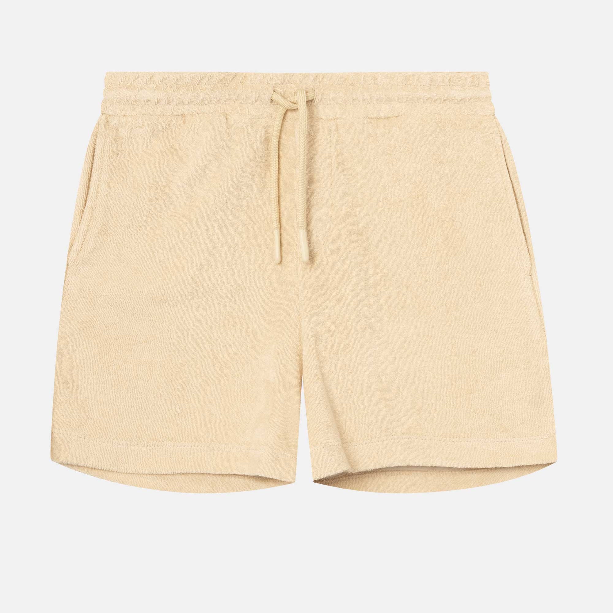 Beige mid length shorts in terry toweling fabric with drawdtring and two side pockets.