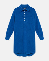 Blue kaftan in terry toweling fabric. With half button closure and one chest pocket