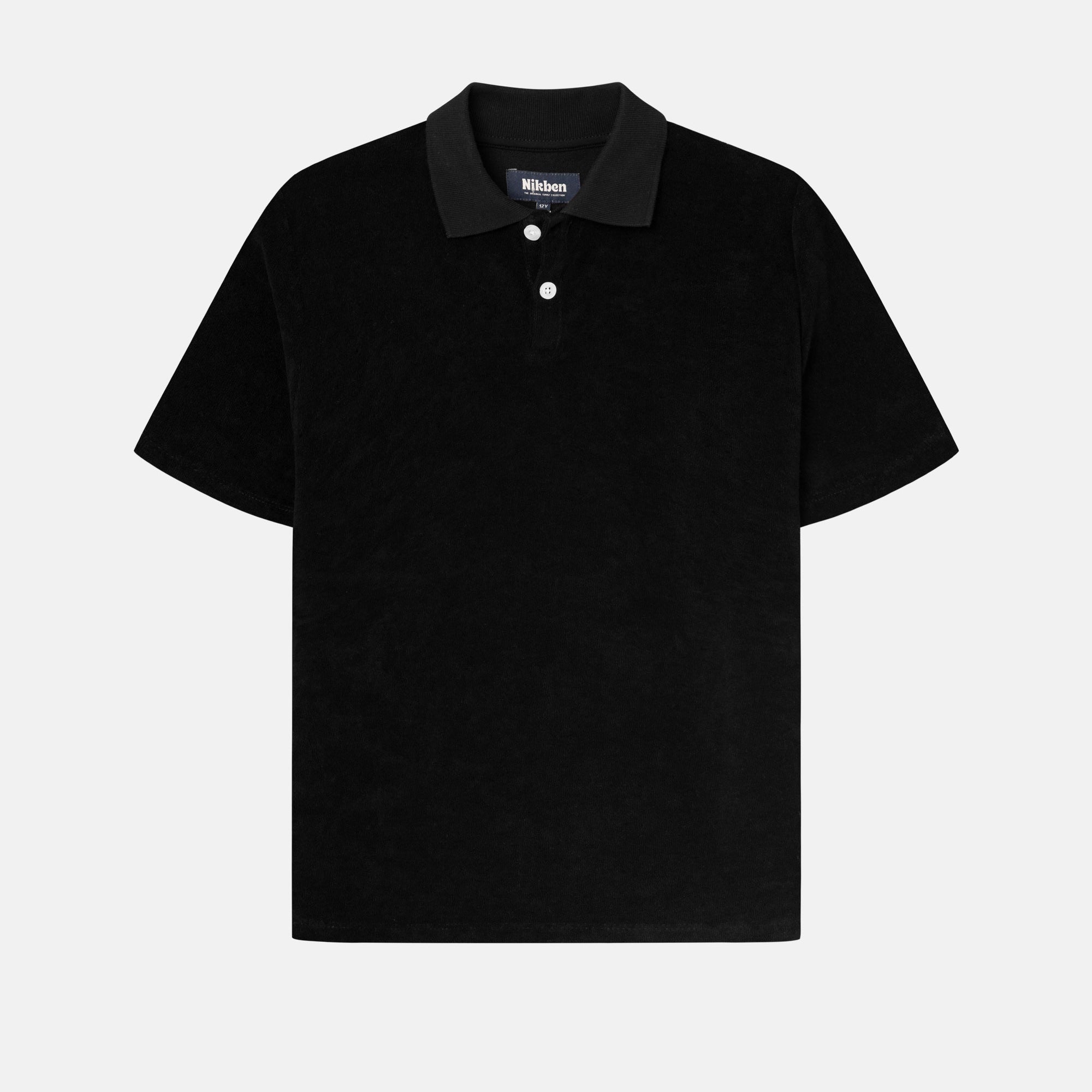 Black short sleeve piké shirt for kids in terry toweling fabric.