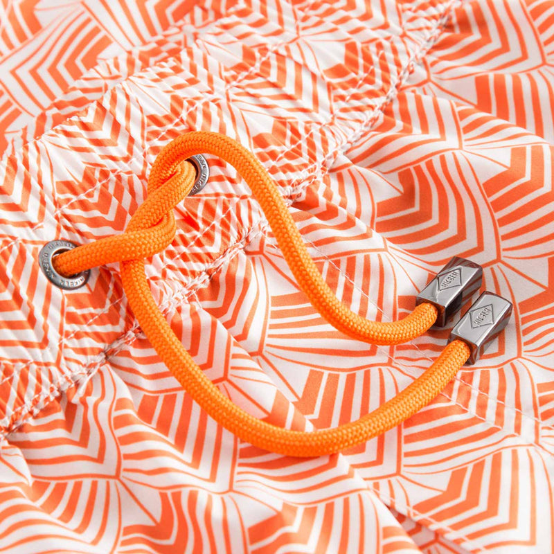 Drawstring waistband on orange/off white swim trunks